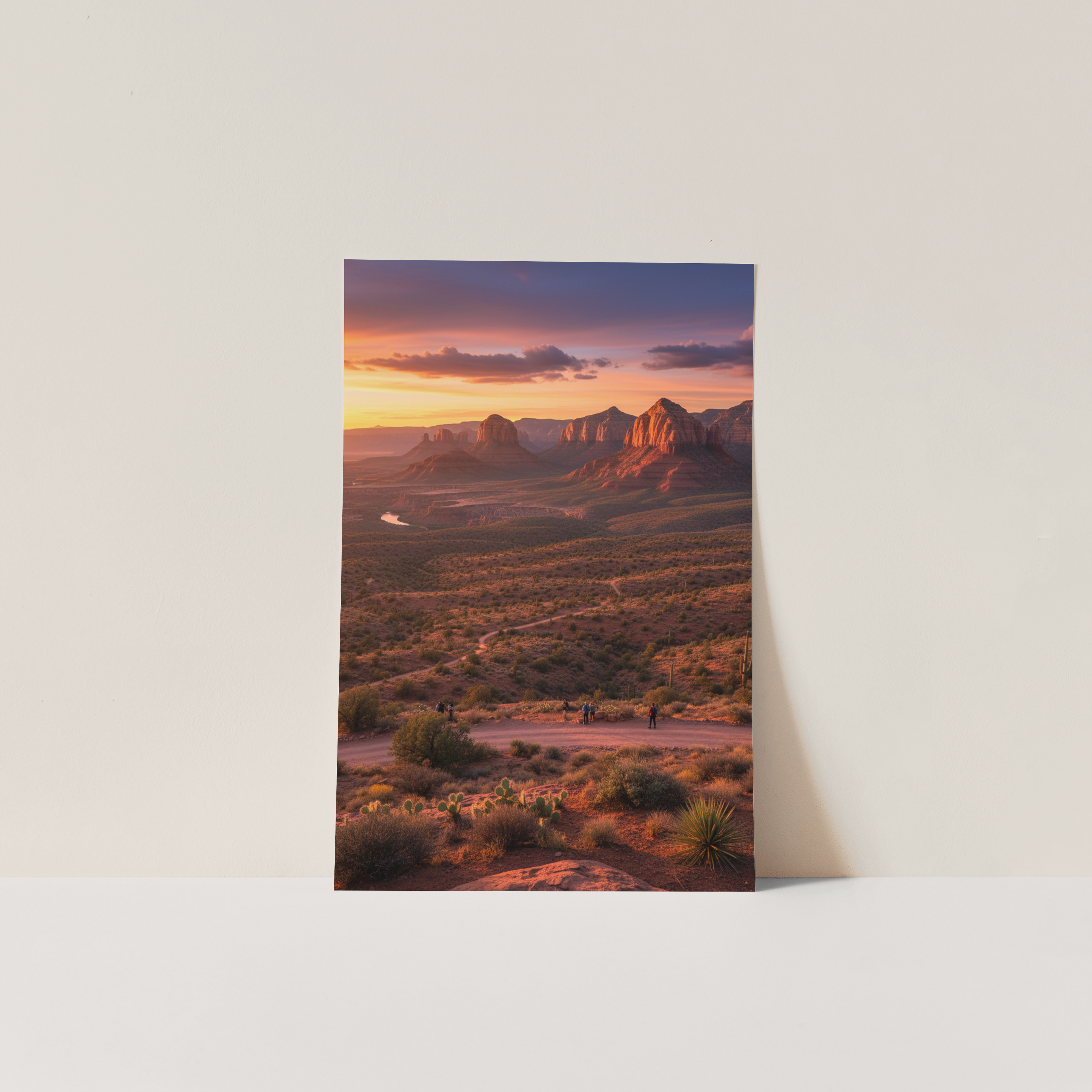 Poster of a desert landscape with a sunset on a white wall