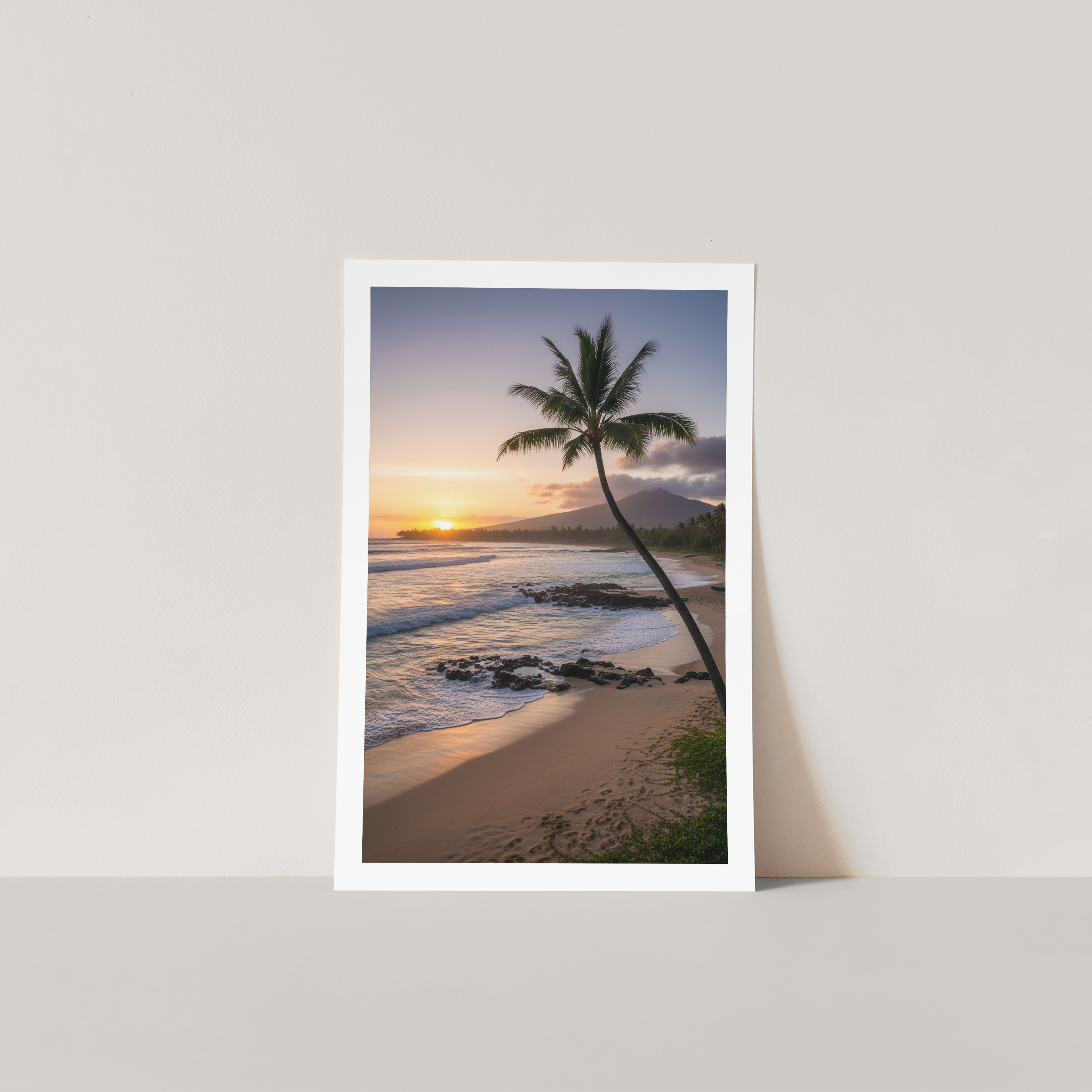 Framed artwork of a tropical sunset with palm tree on a beach.